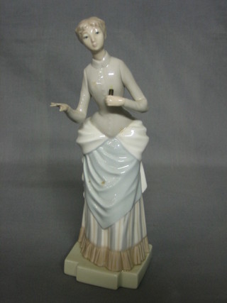 A Nao standing figure of a lady with parasol (f) 11"