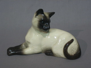 A Beswick figure of a seated Siamese cat, impressed 1538 7" 