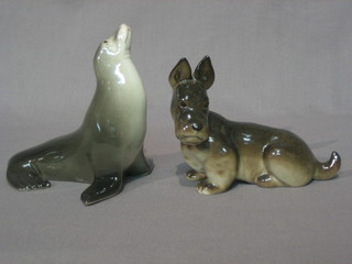 A Russian figure of a Scots Terrier and a sea lion 5"