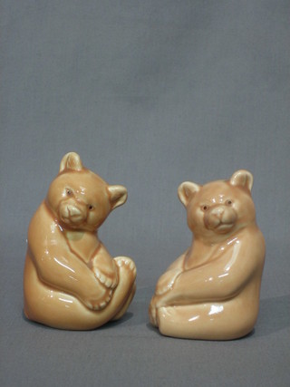 A pair of Poole Pottery figures of seated bears 4"