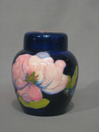 A Moorcroft Magnolia pattern blue glazed ginger jar and cover 6" 