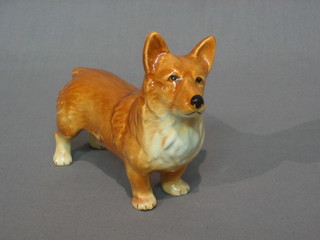 A Sylvac model of a reclining Spaniel 6" and 1 other Corgi 5"
