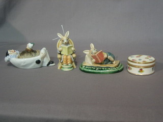 2 pottery figures of humerous seated rabbits reading a book 3" and reclining on a bed 4"