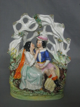A 19th Century Staffordshire arbour group Lady and Gentleman 8"