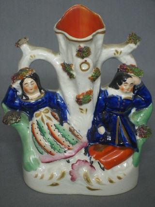 A Staffordshire spill vase supported by 2 reclining figures 6"