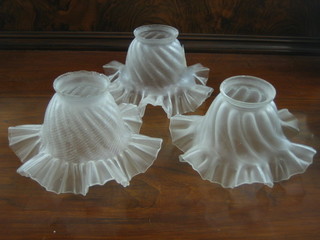 A set of 3 glass lamp shades