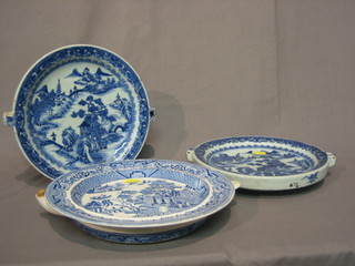 2 19th Century Oriental blue and white plate warmers 9" and a Willow pattern ditto