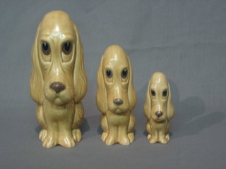 3 Sylvac brown glazed graduated pottery figures of seated dogs