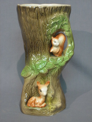 A Hornsea Fauna pattern vase in the form of a tree trunk decorated squirrels 10"