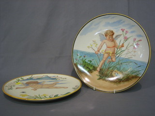 A pair of Victorian Art Nouveau Continental pottery plates decorated Cherubs, the reverse marked CF Oliver 1882 11"