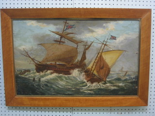 An 18th/19th Century oil painting on board "Two British War Ships in Heavy Seas" 15" x 24"