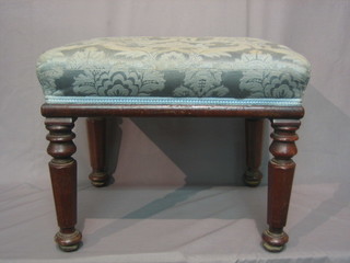 A rectangular William IV mahogany stool raised on turned and chamfered supports 19"