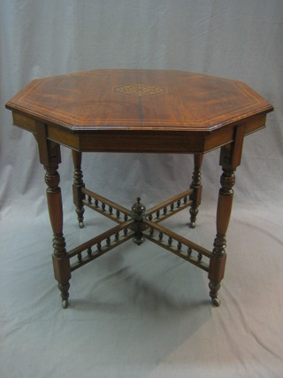 An Edwardian octagonal inlaid rosewood occasional table with X framed stretcher and bobbin turned decoration, raised on turned supports 33"