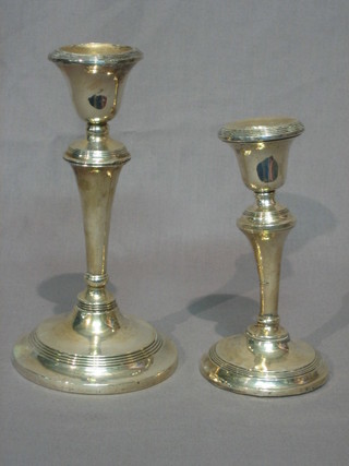 2 1930's silver candlesticks 7" and 6" (somewhat battered)