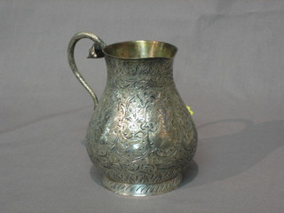 An Eastern engraved white metal jug with Cobra handle 5"