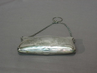 An Edwardian engraved silver purse, Chester 1908 (some dents)