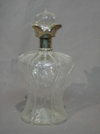 A handsome Victorian cut glass decanter of bell form with silver collar 10"