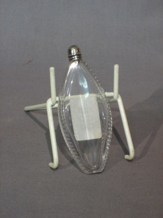 An oval cut glass scent bottle with silver collar 4"