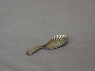 A Georgian silver shell shaped caddy spoon with bright cut decoration, London 1802