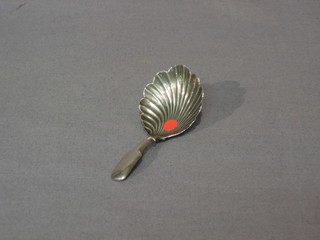 A George III silver shell shaped caddy spoon with fiddle handle, Birmingham 1892