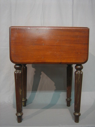 A Victorian mahogany work table fitted 2 drawers, raised on turned and reeded supports 20"