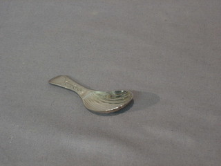 A George III silver caddy spoon with bright cut handle and shell bowl, London 1803
