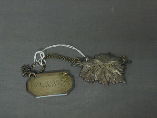 A pierced silver plated brandy label together with a ditto claret label (2)