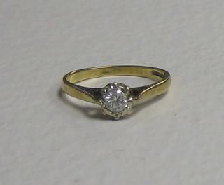 A lady's 9ct gold engagement/dress ring set a solitaire diamond 