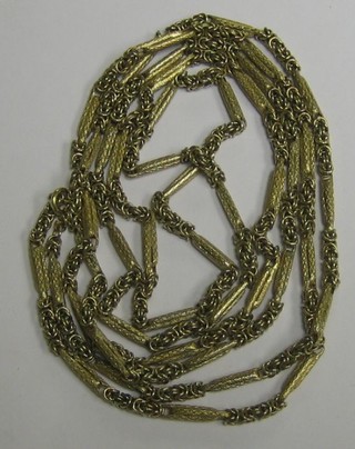 A handsome 9ct gold multi-link guard chain 59"