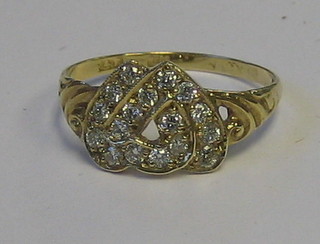 A lady's 18ct yellow gold dress ring in the form of 2 entwined hearts, set numerous diamonds (approx 0.35ct)