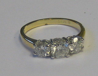 A lady's attractive 18ct yellow gold 3 stone engagement ring set diamonds (approx 1.55 ct)