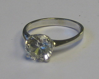 A lady's 18ct gold dress ring set a white stone
