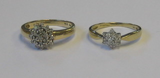 2 gold and diamond cluster rings