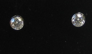 A pair of lady's 18ct gold diamond ear studs (approx 0.42ct)
