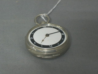 A Continental open faced pocket watch with enamel dial Roman and Arabic numerals contained in a white metal case