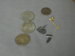 A pair of Danish Sterling silver cufflinks marked BM, an American 1922 silver dollar, 2 Churchill crowns, a Victorian silver sixpence, a Victorian penny and a tie tack