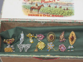 A small collection of brooches and other costume jewellery