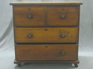 A Victorian mahogany chest of 2 short and 2 long drawers 36" (large crack to top)