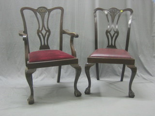 A set of 4 19th Century mahogany Chippendale style slat back dining chairs with upholstered drop in seats  (1 carver and 3 standard), raised on cabriole supports