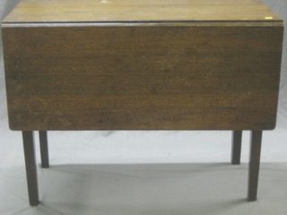 A 19th Century oak drop flap gateleg dining table raised on square supports 38"