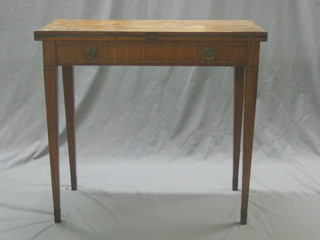 A 19th Century Continental mahogany card table with crossbanded top, raised on square tapering supports 33" 