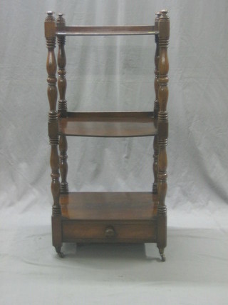 A Victorian mahogany 3 tier what-not raised on turned and block supports, the base fitted a drawer 19"