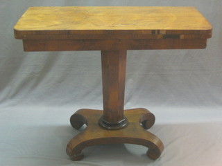 A William IV D shaped rosewood card table raised on a chamfered column with triform base 36" (some veneer lost to the front)