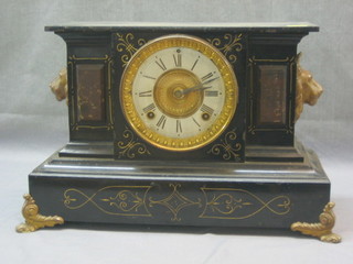 A 19th Century American 8 day striking mantel clock contained in a metal case by Ansonia