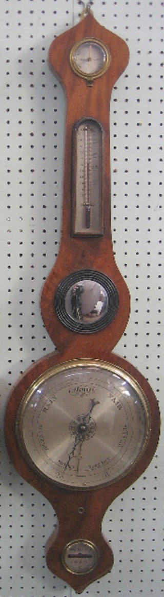 A mercury wheel barometer and thermometer with damp/dry indicator, thermometer, mirror and silvered dial, with spirit level to base, contained in a mahogany case