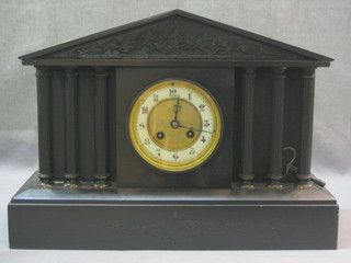 A French 8 day striking mantel clock with porcelain dial and Arabic numerals contained in a black marble architectural case