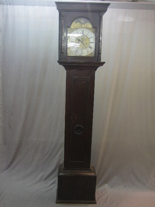 An 18th Century 8 day striking longcase clock, the square 12" dial with gilt metal spandrels, silver chapter ring, subsidiary second hand and calendar aperture by Edward Gibbons of Goldtho Rnhill, with later added arched top marked Restored AD 1895 by C Fitzgerald of Bristol, contained in a marriage oak case 87"