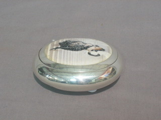 A Victorian oval silver tobacco box, the hinged lid with enamelled portrait decoration of a standing lady walking down steps, London 1889