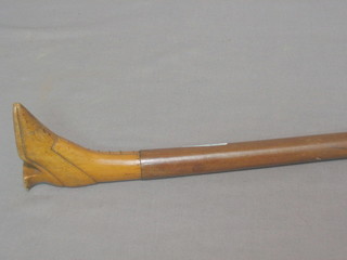 A 19th Century  wooden riding crop, the handle in the form of a wooden boot (slight chip to heel on boot)