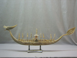 A carved horn model of an Eastern long boat 43"